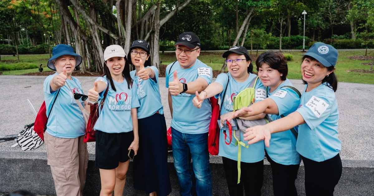 Attendees take a group photo during their team building organized by Dream Station