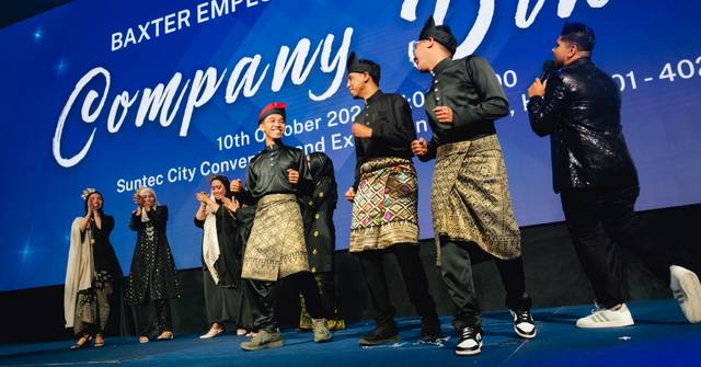 A team performing at a dinner and dance