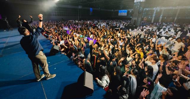 Participants take part in a dance-off challenge at a dinner and dance