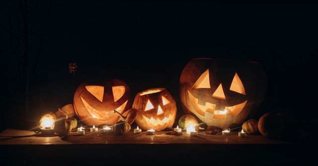 Carved pumpkin decorations at a Halloween party for adults