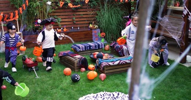 Kids are enjoying a Scavenger Hunt game at a Halloween party