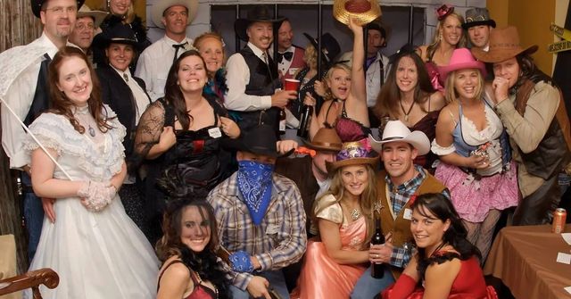 An office Halloween party where everyone dresses up in retro styles
