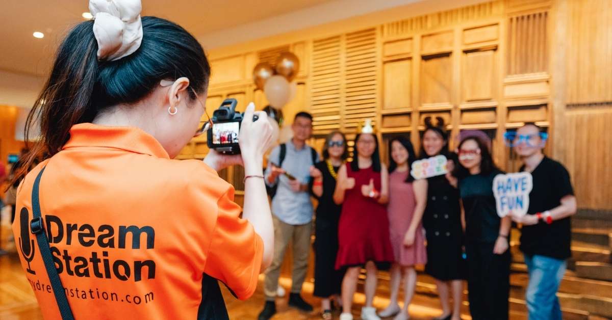 Dream Station staff is taking photos for a corporate event