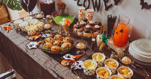 An overview of a Halloween party food table