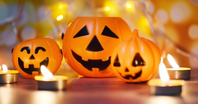 Plastic pumpkin jack-o-lantern decors at a Halloween party
