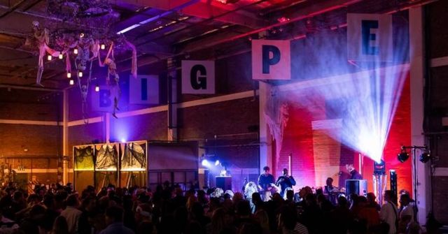 A Halloween party took place in an warehouse