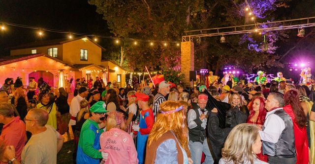 An overview of an outdoor Halloween party