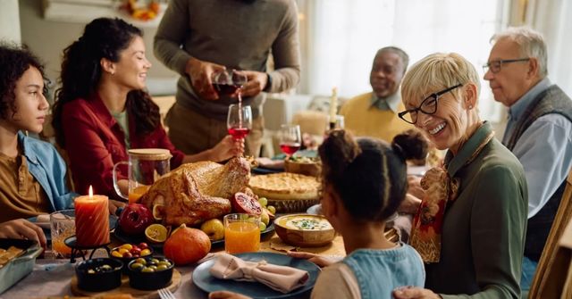 A group of participants enjoy the Thanksgiving Turkey Word Chain game