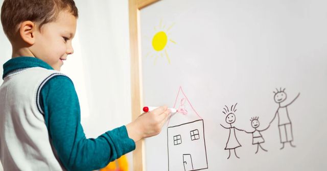 A child in the Thanksgiving Pictionary game