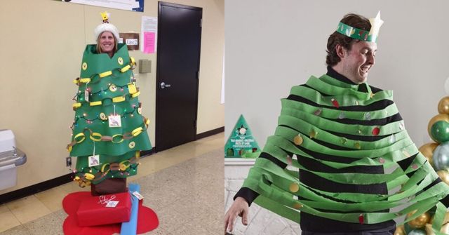 Two colleagues dressed as Christmas trees after the human Christmas Tree contest