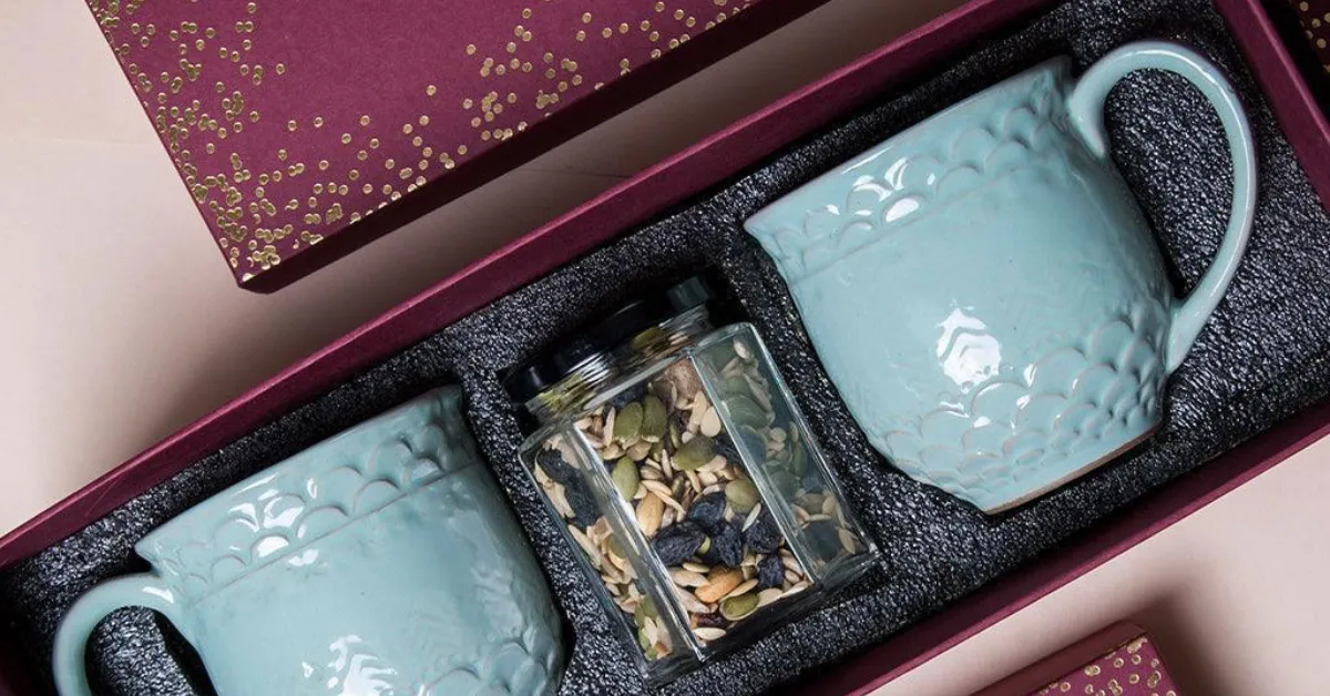 Coffee mugs as conference swag to attendees