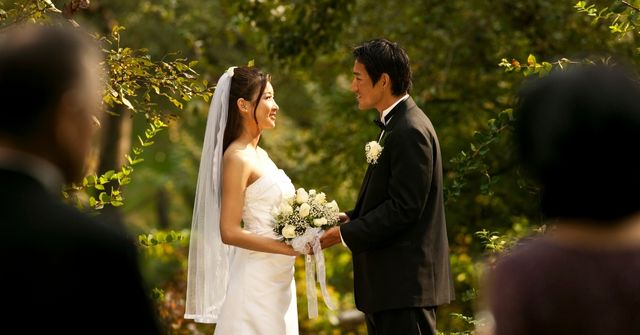 A bride and groom sharing their vows at their wedding organized by professional wedding planner