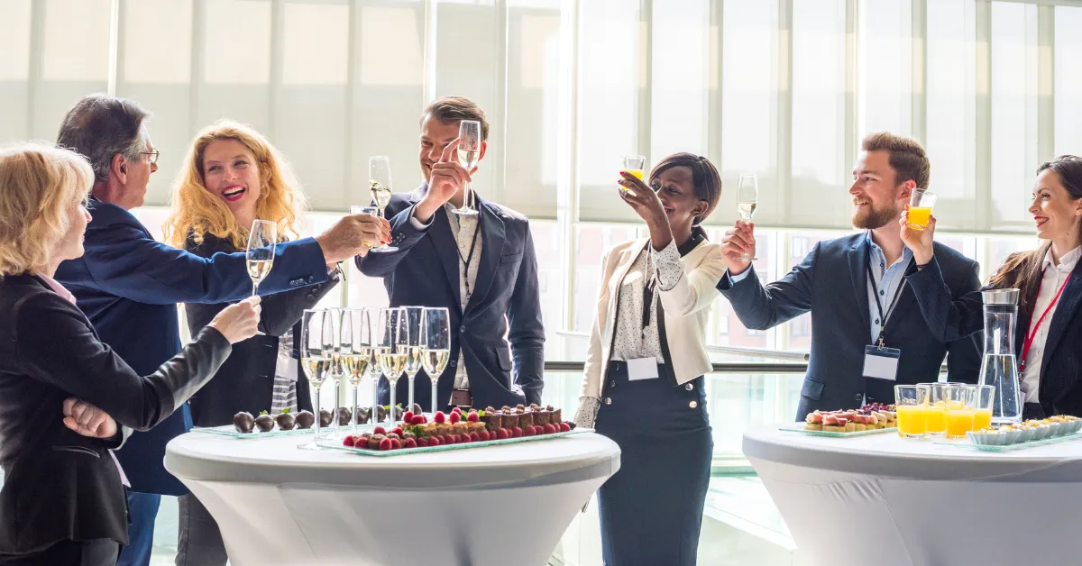 A diverse group of people having a good time at a corporate event