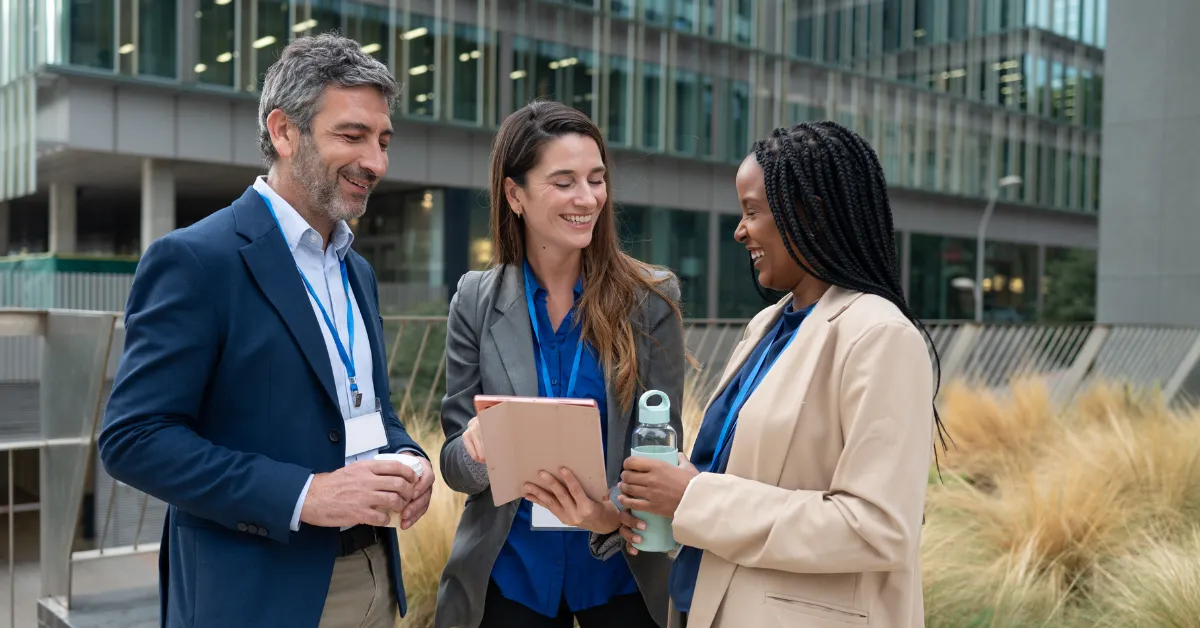 Three people doing site visit at a venue for their upcoming corporate event