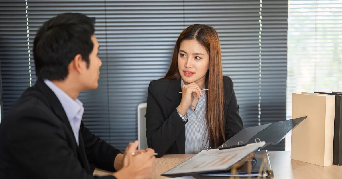 A planner in discussion with a venue representative