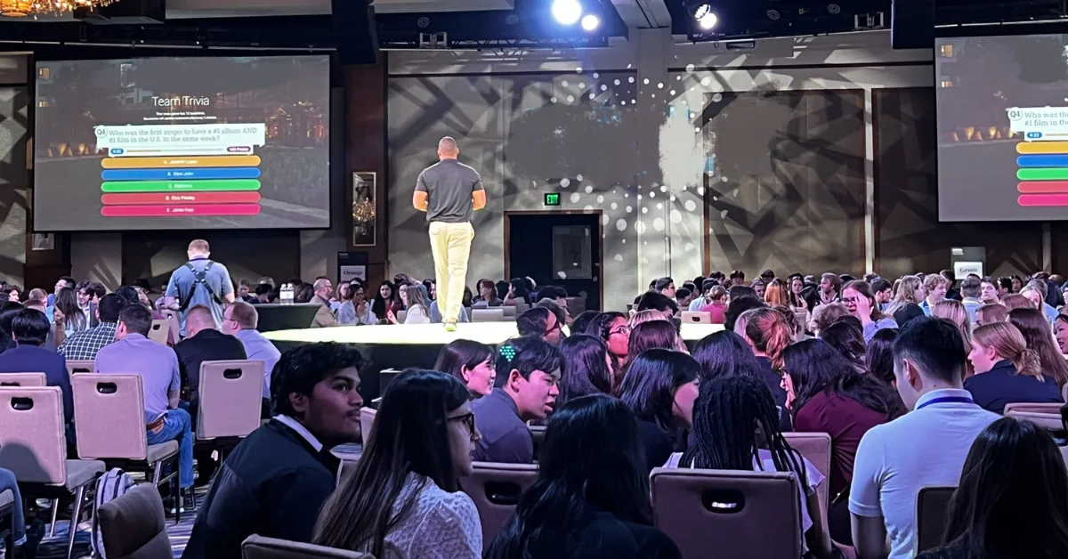 Seminar attendees participating in a trivia icebreaker activity