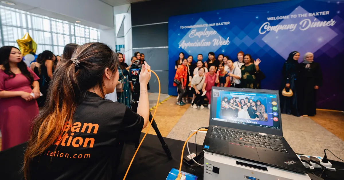 Dream Station staff running our photobooth at an event
