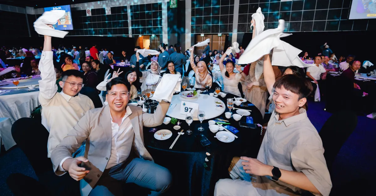 Guests joyfully participating in one of the games for dinner and dance - Bingo